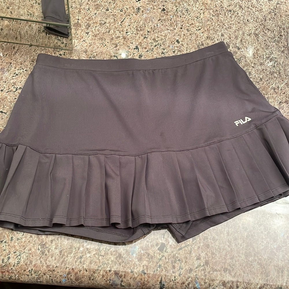 Used once- Fila tennis skirt. Size L